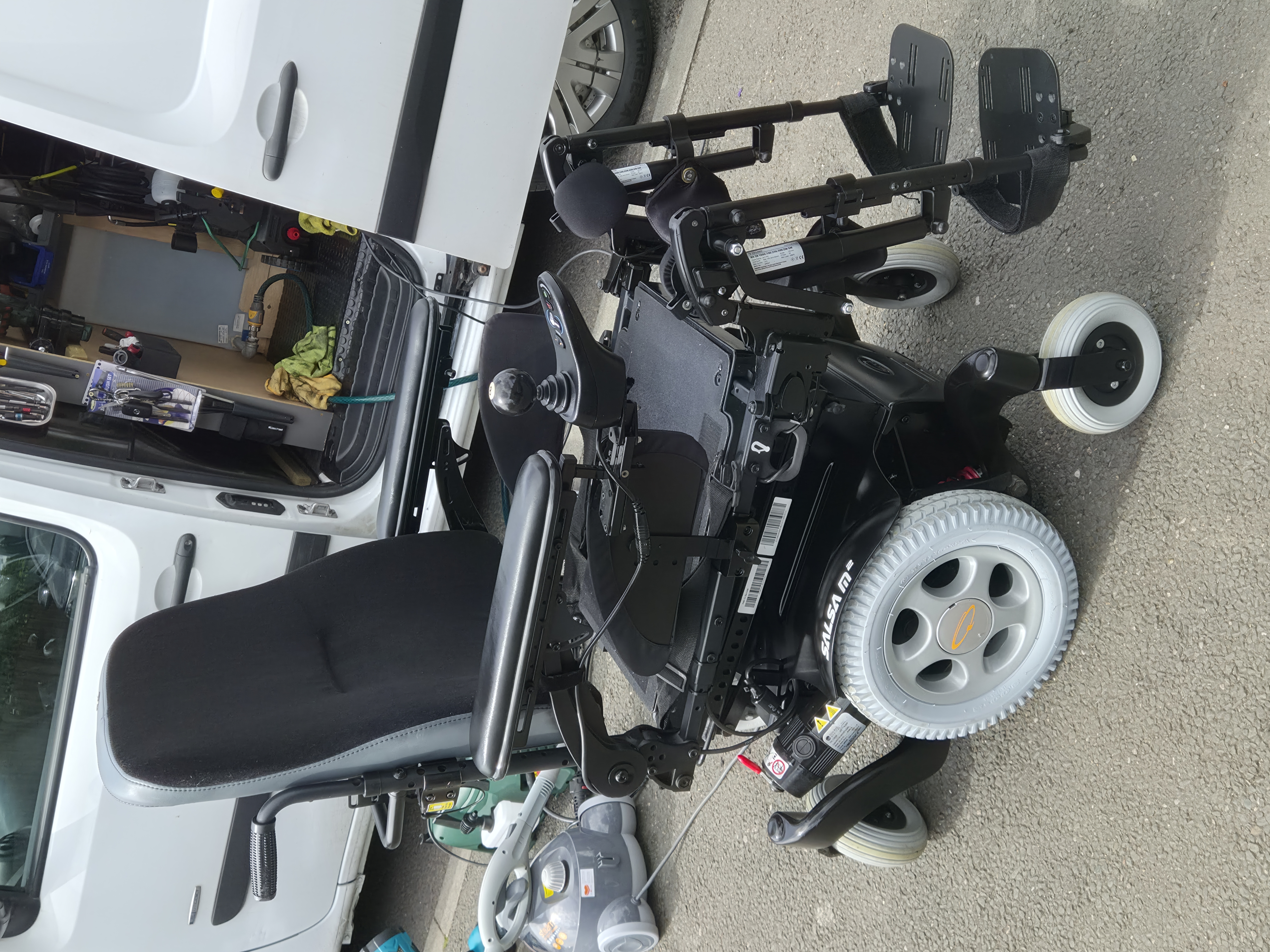 Power wheelchair being professionally cleaned on-site